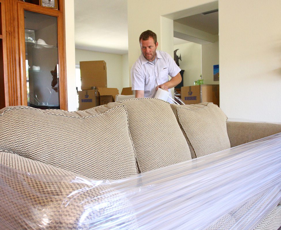 Allied mover with sofa. Stillwater, MN Movers - Piepho Moving & Storage